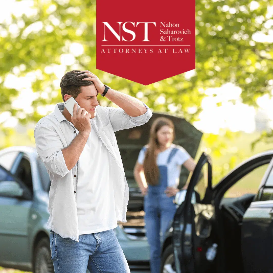 Man on phone after accident