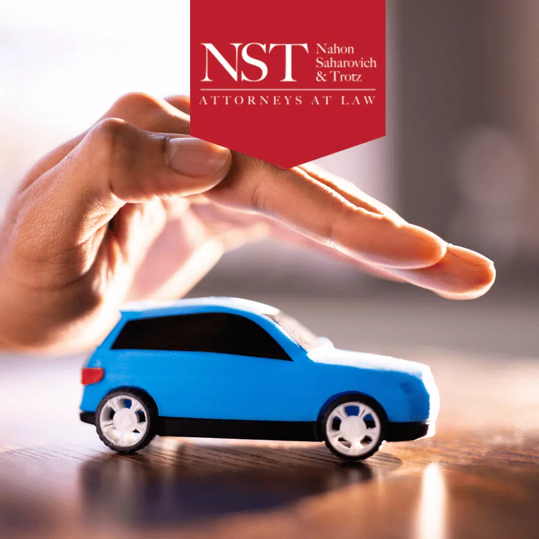 hand over blue toy car