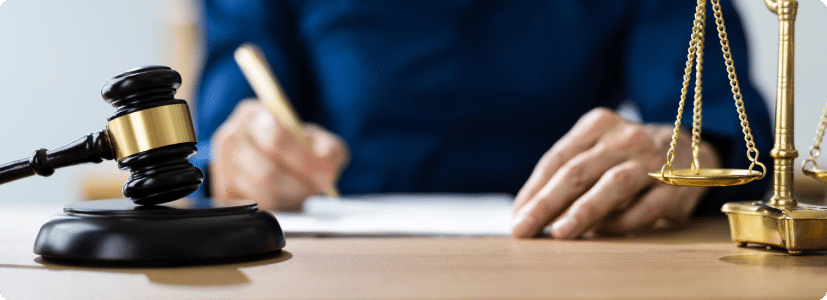 A lawyer signing an important document