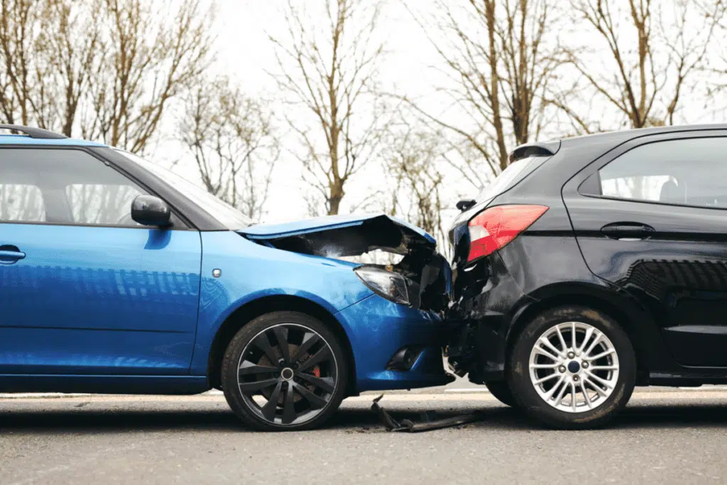 rear end accident blue and black car