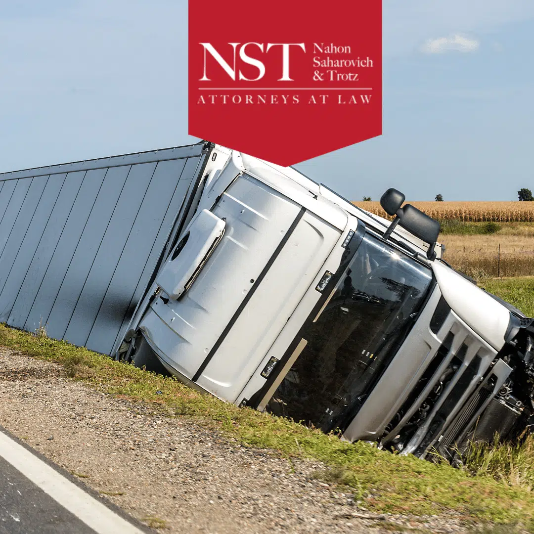 Semi truck on it's side
