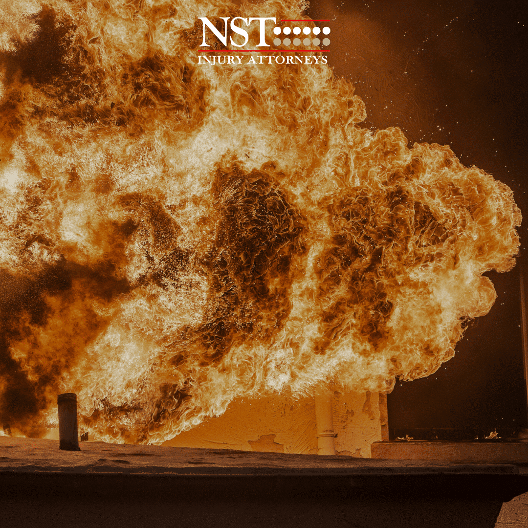 Image of an explosion with the NST Law logo