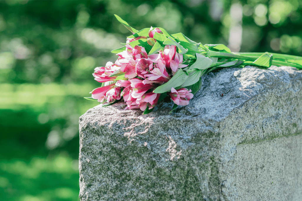 Photo showing flowers on a headstone in Pine Bluff, Arkansas