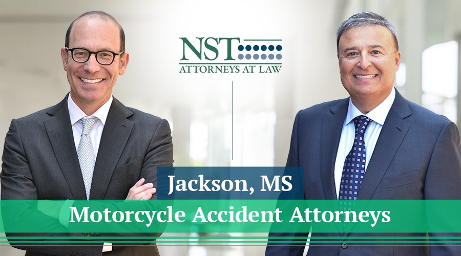 Photo of NST Law attorneys with text reading "Jackson Motorcycle Accident Attorneys"