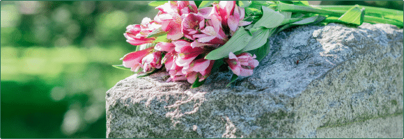 flowers on a grave site in jackson ms