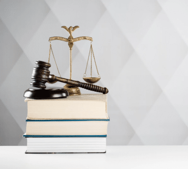 A gavel, scale, and books