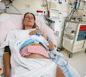 Woman lying on the hospital bed