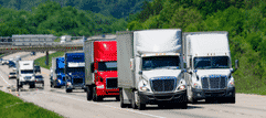 Trucks Running Down The Interstate Highway
