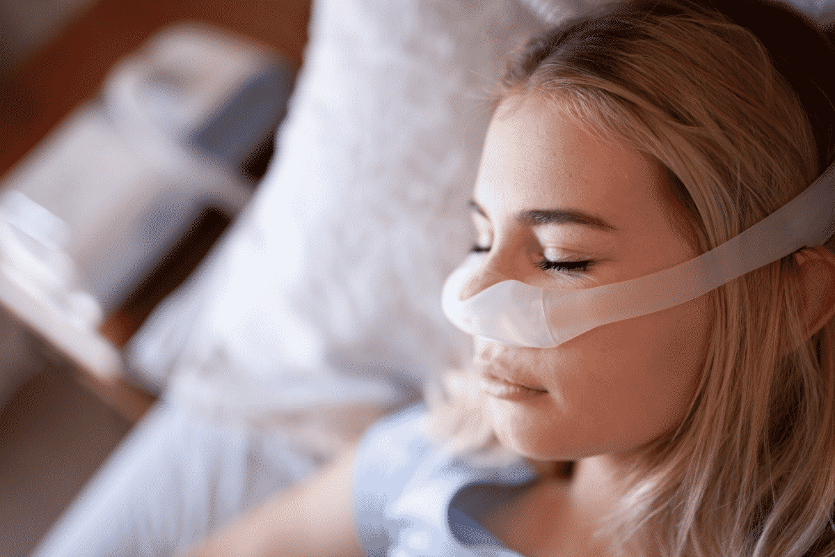 Woman sleeping with cpap