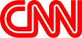 Red and white CNN logo displayed against a white background. The logo consists of the letters C, N, and N, with the letter C tilted to the right and positioned above the other two letters. The logo is simple and recognizable, conveying a sense of authority and credibility in news reporting.