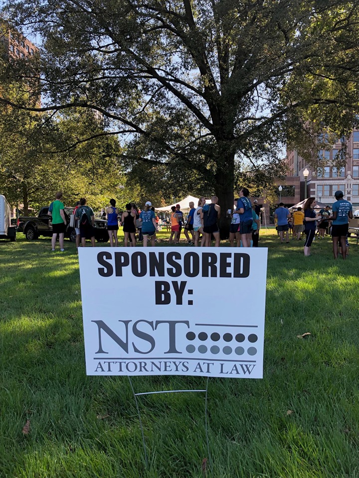 Sign that says Sponsored By NST